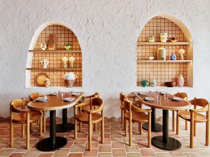 Terracotta pavers and arches cut into white stucco walls