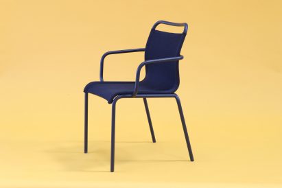 Purple chair against yellow background