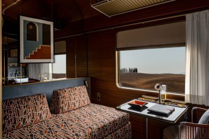 Deluxe train suite with patterned sofa-bed