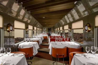 Dining car on train designed by Dimore Studio
