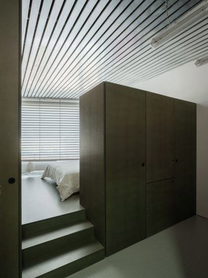 Raw MDF cabinets in sage green