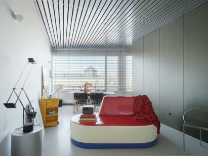 Glossy red, blue and cream sofa