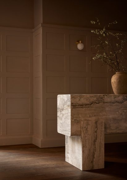 Close-up of travertine consoile