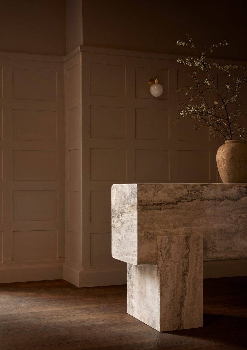 Close-up of travertine consoile