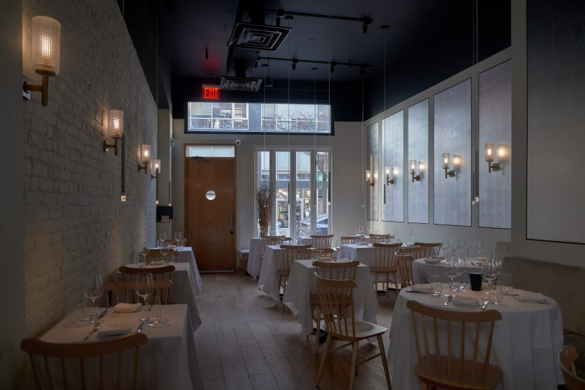 White tables and wooden chairs