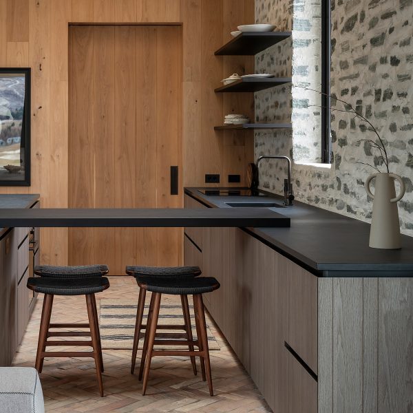 Kitchen interior with custom timber cabinetry and Fisher & Paykel appliances