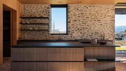 Kitchen interior with custom timber cabinetry and Fisher & Paykel appliances