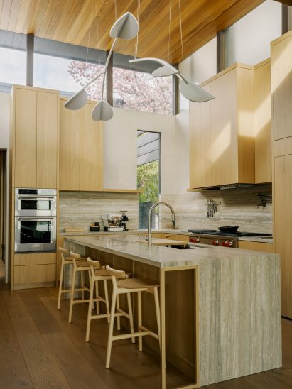 Kitchen with a tall ceiling and clerestory windows
