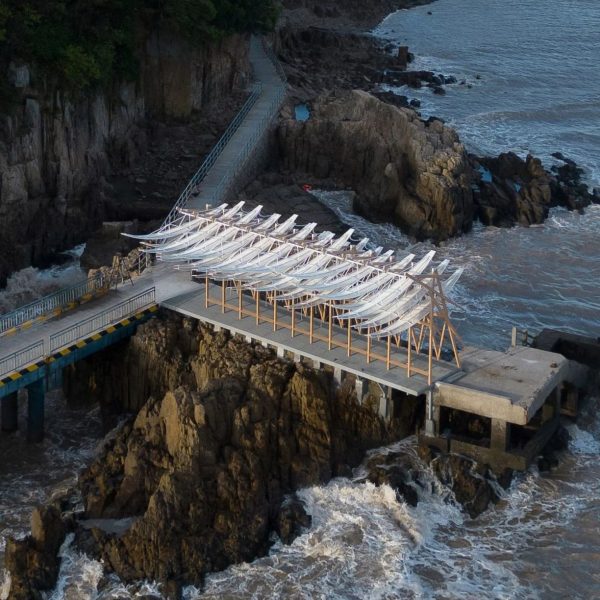 Kinetic seaside pavilion with leaf-like canopy China
