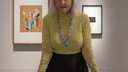 Penelope Seidler standing in exhibition space