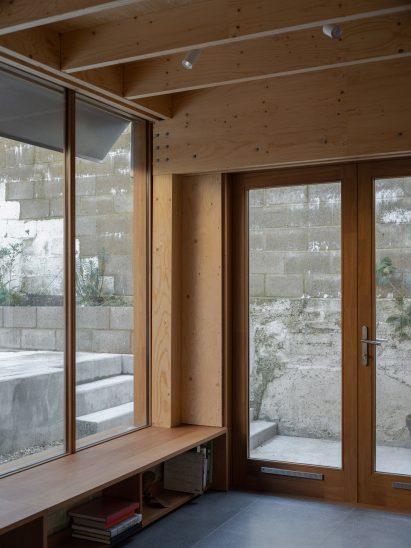 View out towards garden at House on a Hill by Hugh Strange Architects