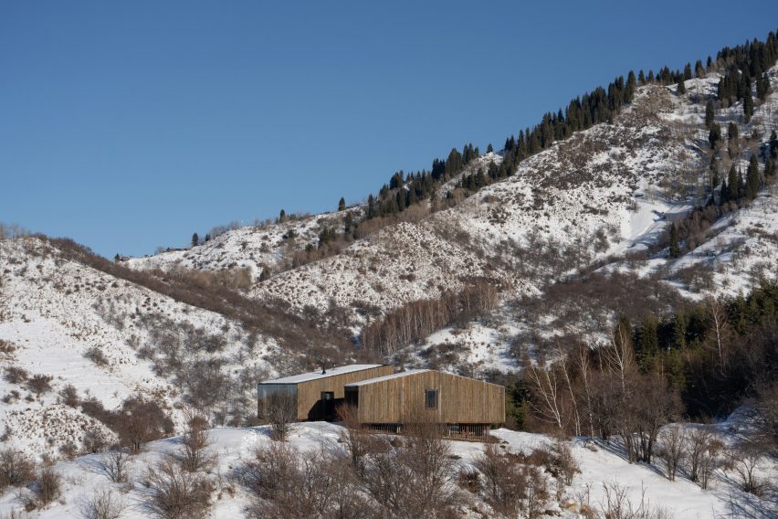 Holiday cabins on snowy mountain