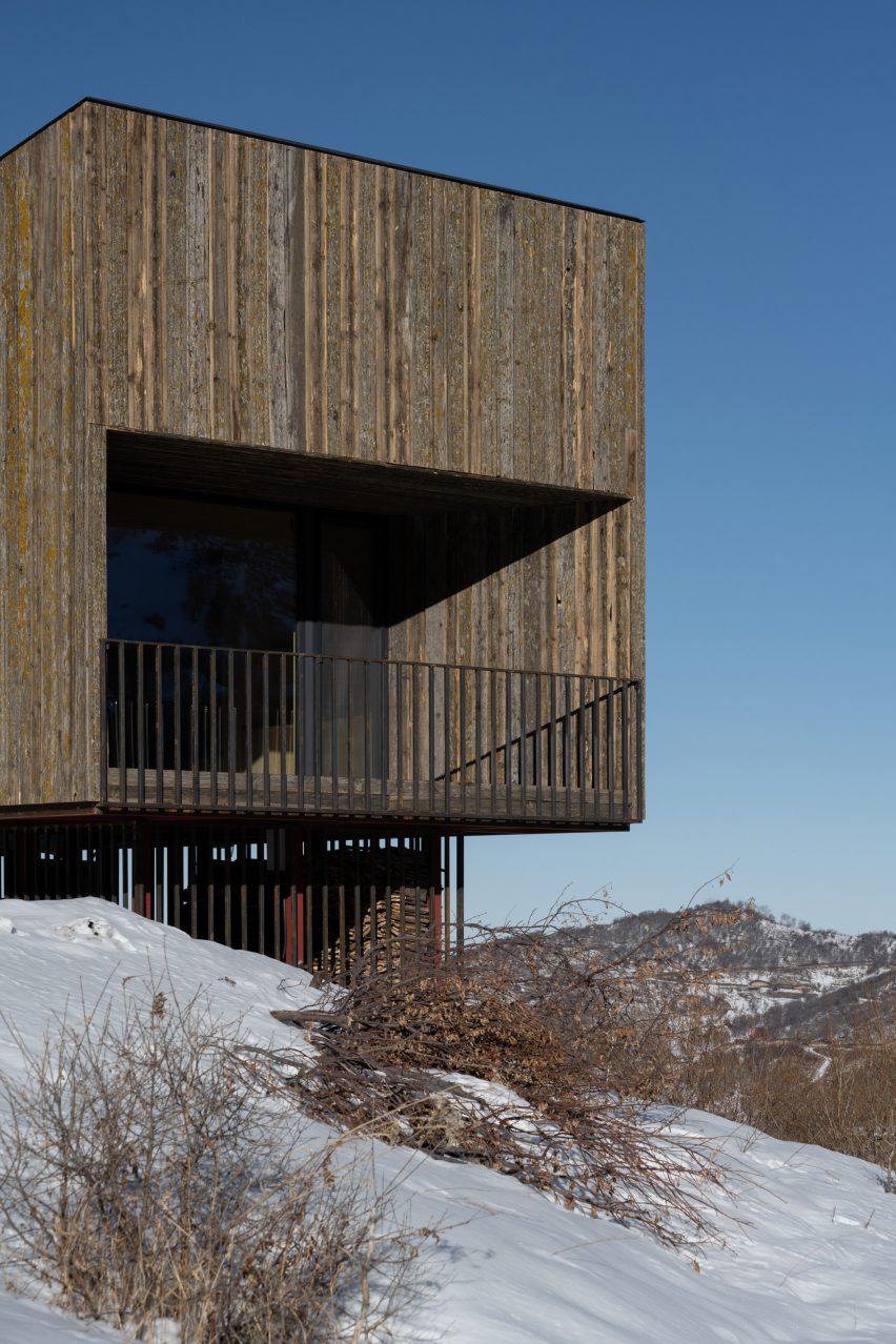 Wooden cabin with balcony