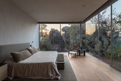 Bedrooms with full-height wraparound windows