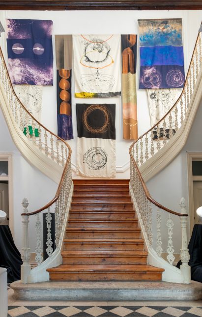 Textiles in staircase in Lisbon