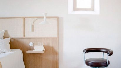 Minimalist bedroom with wooden details