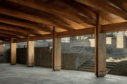 Roof truss and column structure is exposed inside a long building