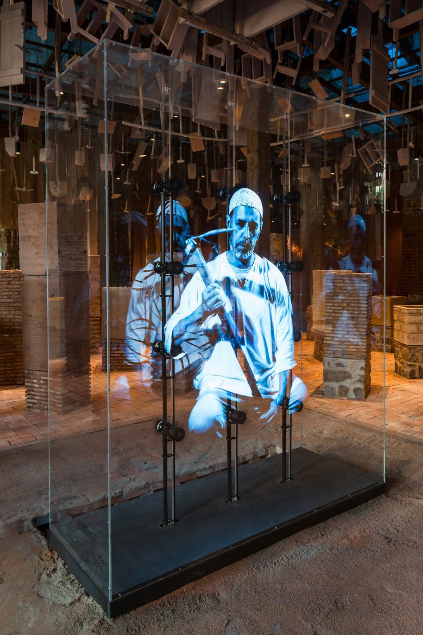 Photo of the centre of the Morocco Pavilion showing a hologram of a man at work with a tool
