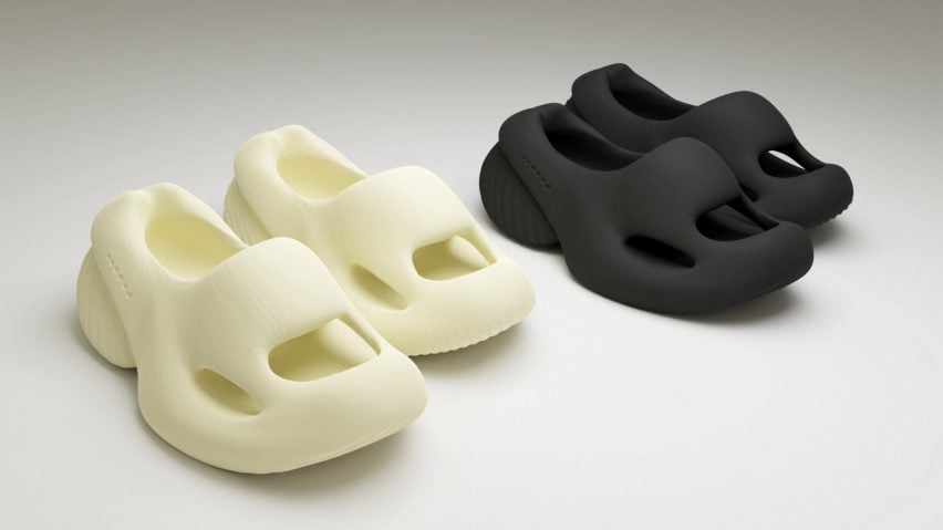 a photograph of two pairs of shoes next to each other, one in white and one in black