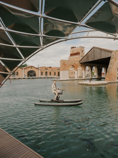 Foster on a water bike