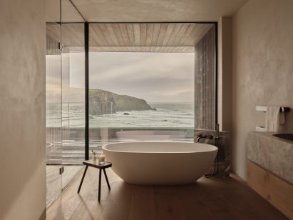 Bathroom in Two-Family House by Rundell Associates