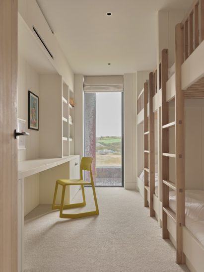 Bunk room in Two-Family House by Rundell Associates