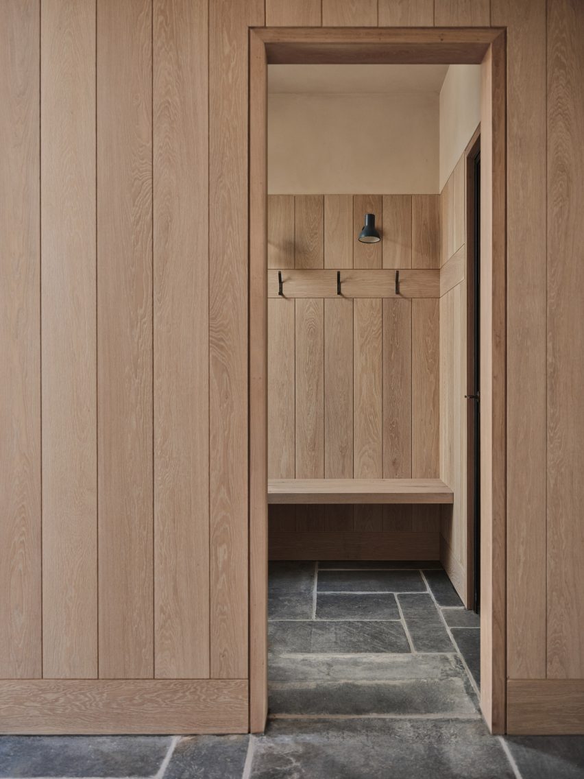 Timber walls inside Two-Family House by Rundell Associates