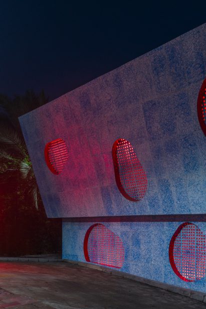 Facade of Self Care Community Centre in Jakarta by Space Available, Sidarta and Sandaja and Andika Wahyu at night