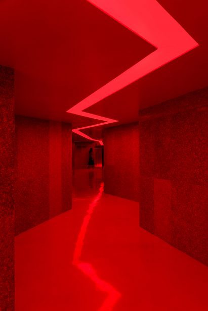 Red entrance hallway of Self Care Community Centre