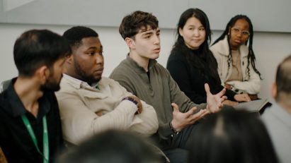 Students talking as part of a lecture/workshop