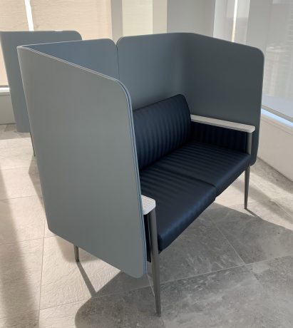 an image of a seating booth in tones of blue