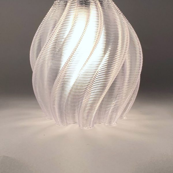 a photograph of a 3d-printed lampshade in white tones