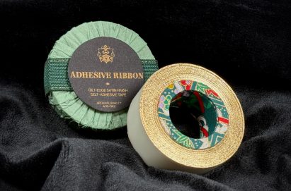 a photograph of two rolls of tape