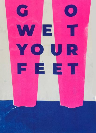 an illustration in tones of pink and blue, with the words 'wet your feet' on it
