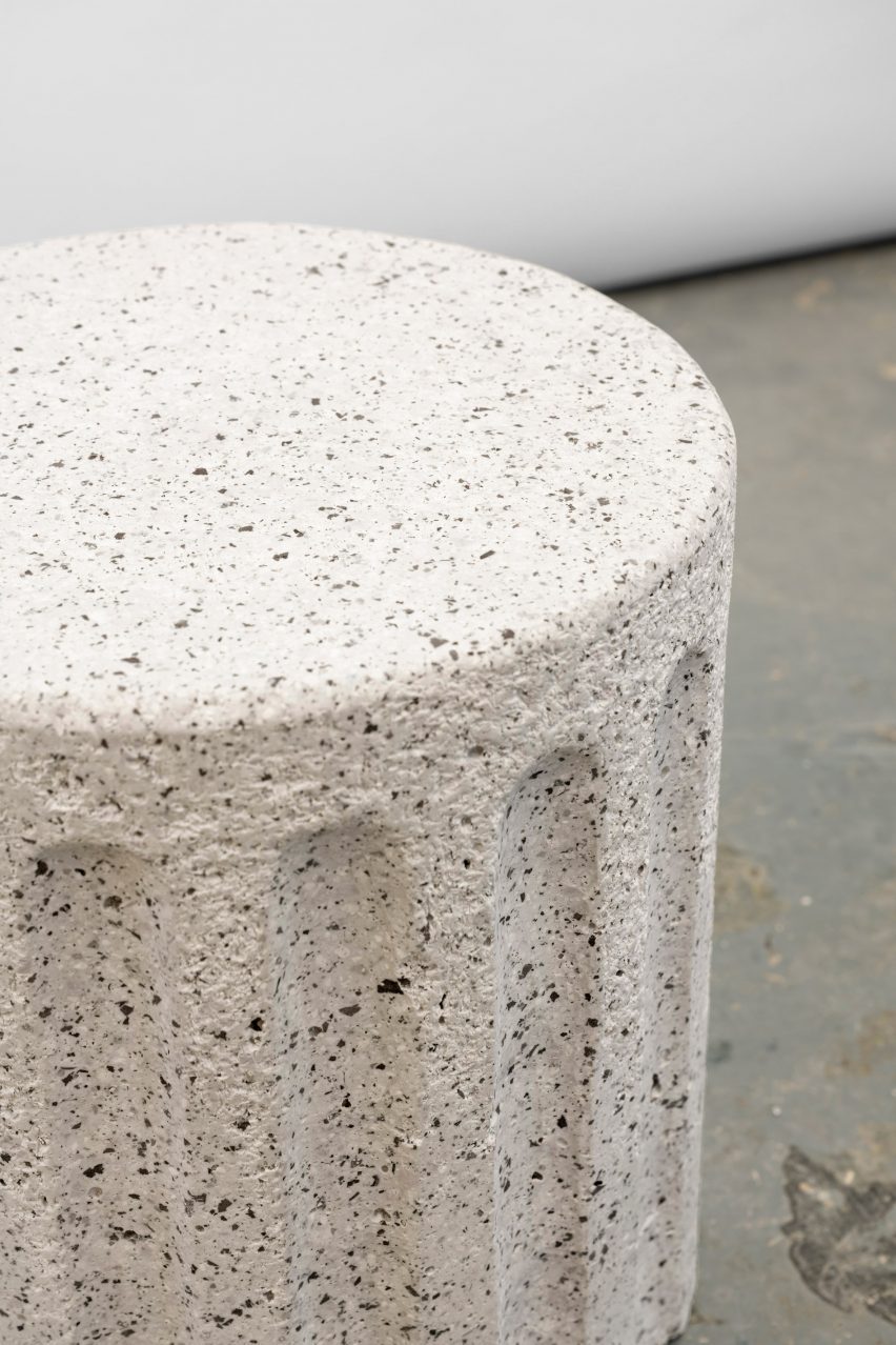 Close up photograph of a stool from the collection showing its composition from rubber erasers.