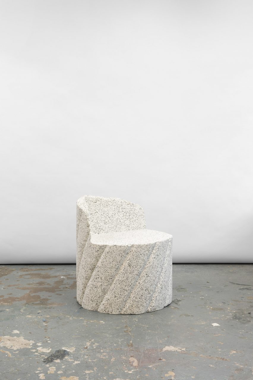 Photograph of the white granite-looking armchair.