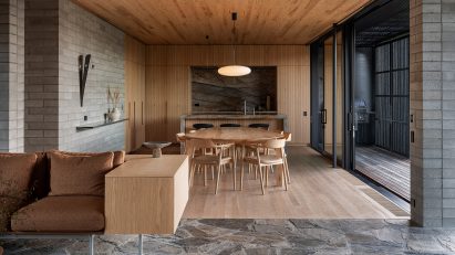 Timber kitchen featuring luxury appliances 