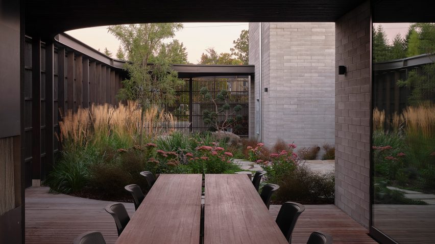 Timber screens create a protective facade
