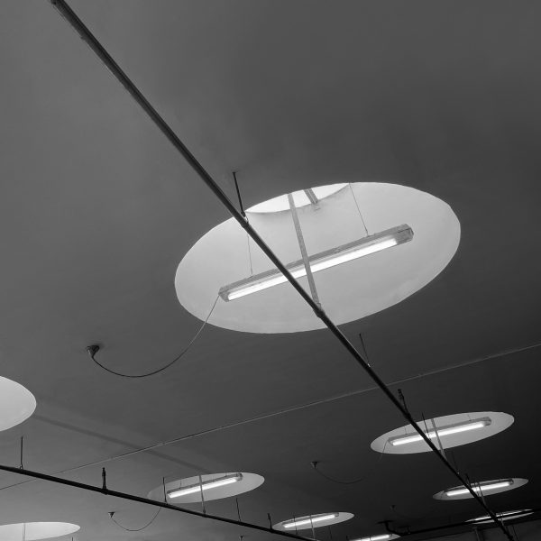 Black and white photo of ceiling lighting