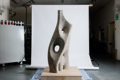 a photograph of a grey concrete sculpture