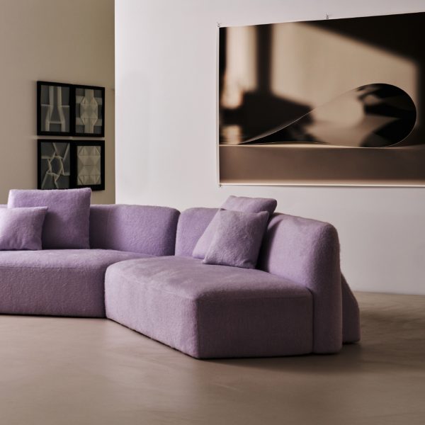 Photo of purple sofa by Man of Parts