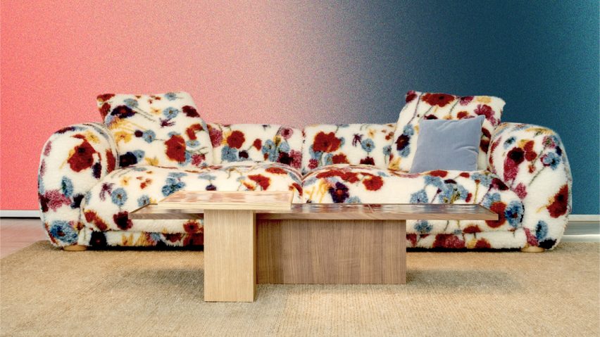 Photo of colourful sofa and wooden coffee table by Moroso