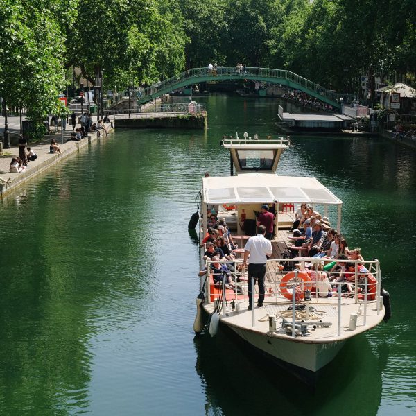Boat floating down the Parisian canal