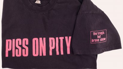 'Piss on Pity' T‑shirt by Sue Elsegood and Disabled People's Direct‑Action Network, 1992