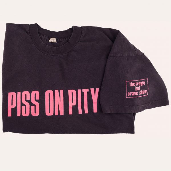 'Piss on Pity' T‑shirt by Sue Elsegood and Disabled People's Direct‑Action Network, 1992