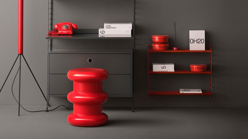 Photo of a grey with red furniture and accessories