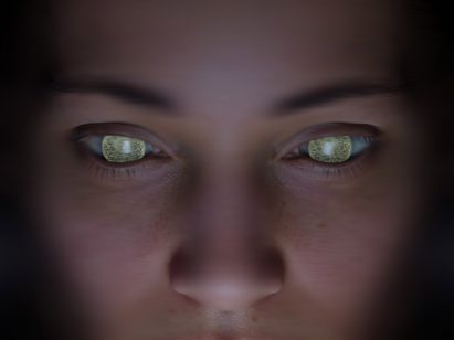 Close-up of a face with green eyes