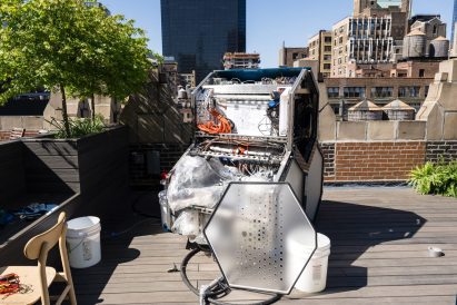 Photo of the Aircela machine open at the side to reveal a dense system of mechanics