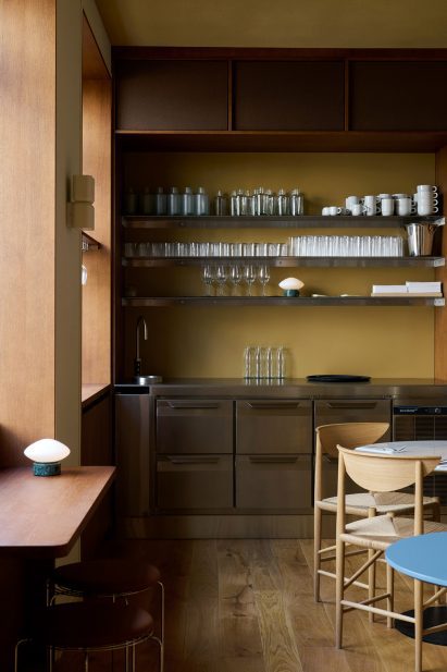 Restaurant space with green wall