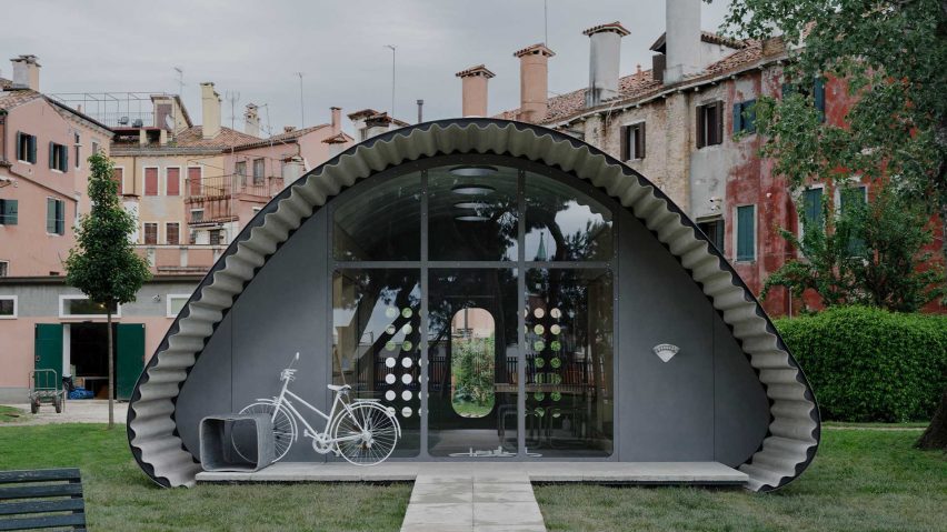 Image shows a small rounded home designed by Norman Foster Foundation